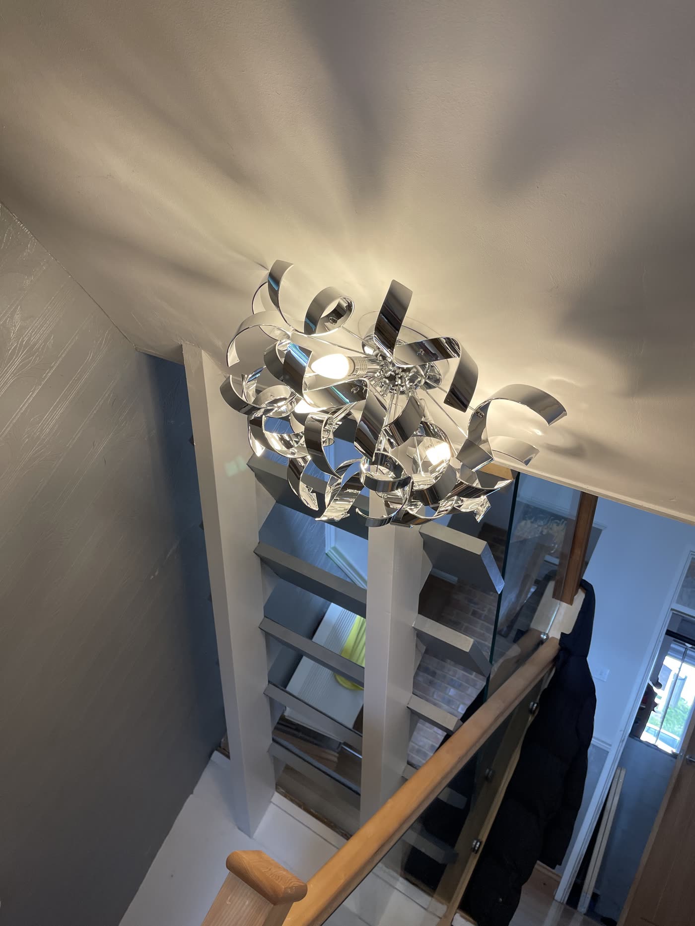 Two chandeliers, fitted next day